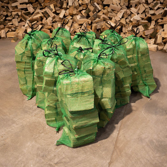 15x large net sacks of kiln-dried hardwood firewood logs, ready to burn